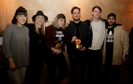 Port Cities’ Dylan Guthro and one of his co-writers, Dana Beeler, receive a SOCAN No. 1 Song Award for the band’s “Back to the Bottom.” Left to right: SOCAN’s Melissa Cameron, Port Cities’ Breagh MacKinnon, co-writer Dana Beeler, Port Cities’ Dylan Guthro and Carleton Stone, and SOCAN’s Andreas Rizek. (Photo: Tiana Feng)